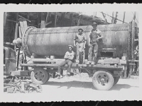 This kiln was moved to Carrara, Nevada. 1930s (L-R David Banovitch, Shorty Roberts, Vernon Scott.)Dorothy Casner Evans Photograph Collection