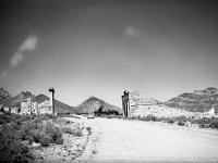 default (5)  Henchey, Paul L. Golden Street, Rhyolite, Nevada, SV-55. UC Davis Library, Archives and Special Collections, 10 Oct. 1949. digital.ucdavis.edu